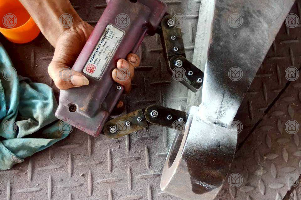 Yoke placed across a structural weld
